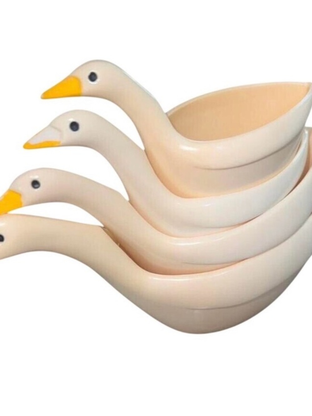 vintage JSNY melamine nesting measuring cups shaped like geese.